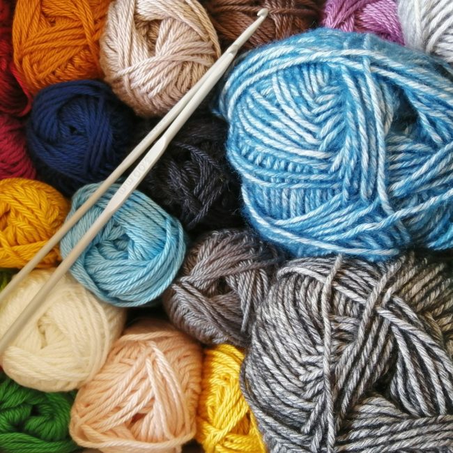 orange blue and white yarn